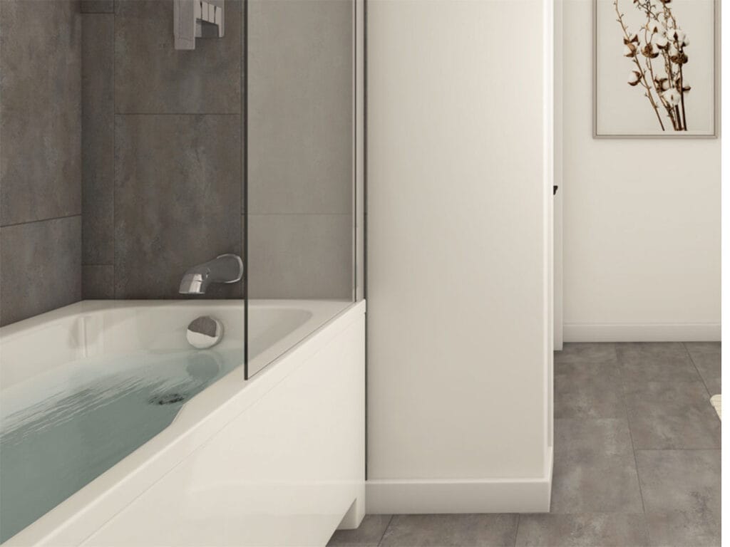 Salle de bain d’un appartement du projet Desrosiers, baignoire et douche vitrée